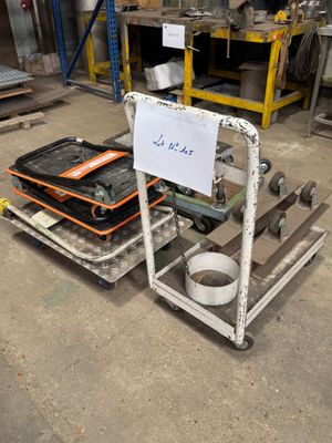 a cart that has a sign on it in a warehouse