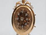 an image of a gold locke with diamonds on a white background