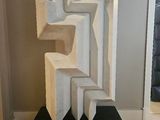 an image of a sculpture made of concrete blocks