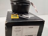 a black box with two bowls on top of it