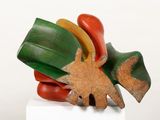a sculpture of a leaf on top of a pile of vegetables