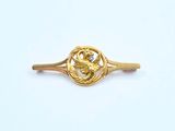 bague en or jaune ornée d'un oiseau et d'un diamant au centre