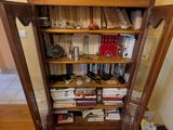 a book shelf with books on top of it