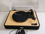 a turntable with a record player and headphones on it