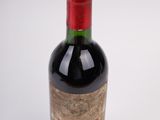 a bottle of wine that is sitting on a table