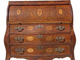 an image of a wooden chest of drawers with ornate carvings