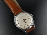 a watch that is sitting on a table