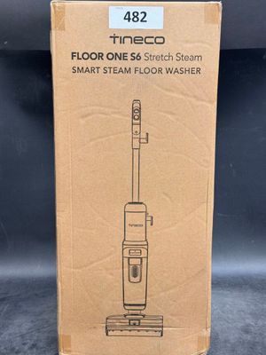 a box of a vacuum cleaner sitting on top of a table