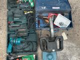 many tools in the case on the concrete floor