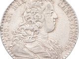 gros plan d'une pièce de monnaie sur fond blanc