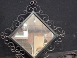a mirror that is sitting on a table