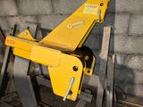 a yellow crane that is sitting on top of a table