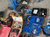 a lot of tools that are sitting on the floor