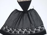 an image of a black and white dress with sequins on it