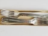 a box of silverware with a fork and a knife in it