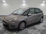 the grey citrole is parked on a checkered tile floor