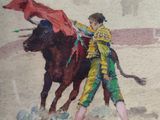 a painting of a bull and a man with a red cape