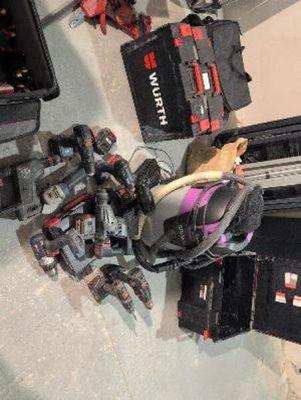many tools that are sitting on the floor next to each other