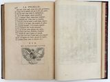 an open book with a picture of a butterfly on it