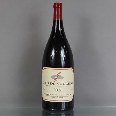 a bottle of wine that is sitting on a table