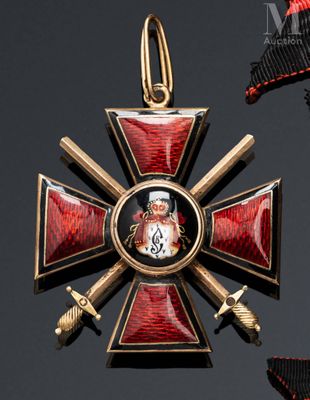 a red and gold cross with a picture on it
