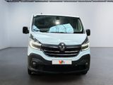 the front of a white van parked in a showroom