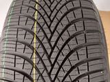 a close up of a tire on a wooden surface