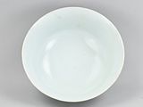 an image of a white bowl sitting on top of a table