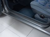 a seat in the back of a car with the door open