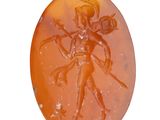 une image représentant une agate orange sculptée sur laquelle figure un homme tenant une épée