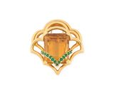 a close up of a gold ring with a citrine stone