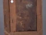 an old wooden easel with a painting on top of it