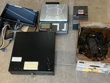 a lot of electronics that are sitting on the floor