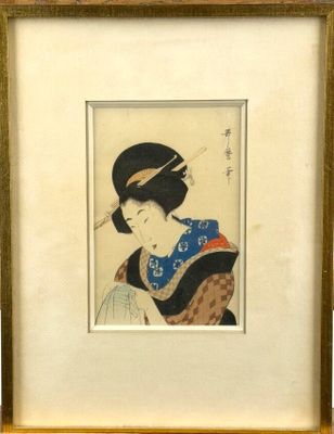 an old picture of a woman in a kimono dress smoking a cigarette