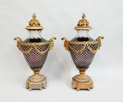 pair of antique vases with gold and purple decoration on stands