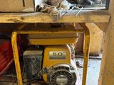 a yellow table with a box on top of it