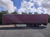 a semi truck that is parked in a parking lot