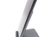 a cell phone that is sitting on a stand