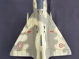 a model of a fighter jet on display on a table