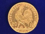 l'image d'une pièce d'or ornée d'un coq