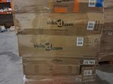boxes stacked on top of each other on a pallet in a warehouse
