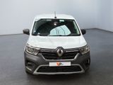 the front view of a white van parked in a room