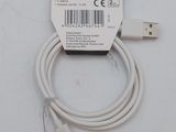 an image of a white usb cable connected to a white phone