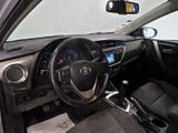 a picture of a car with a steering wheel and dashboard