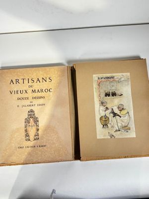 two books that are sitting on top of a shelf