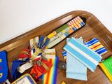 a wooden tray with a variety of items on it