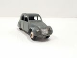a toy car that is sitting on a white surface