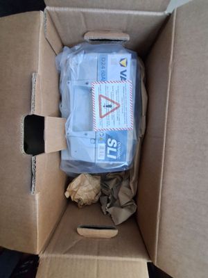 a cardboard box with some items inside of it
