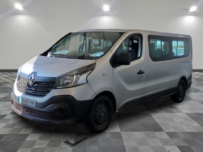 a picture of a silver van parked in a room