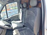 a white van with two seats in the back of it